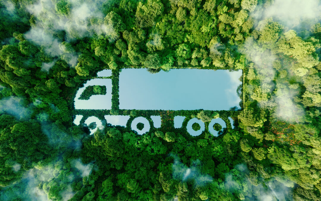 Sustainable logistics concept: A truck-shaped lake in the middle of a forest.